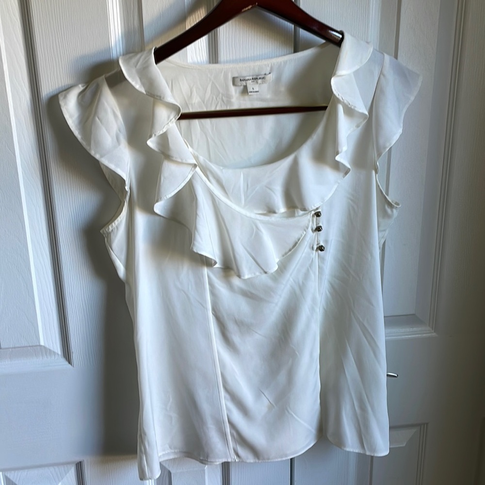 Beautiful Banana Republic cream colored blouse.